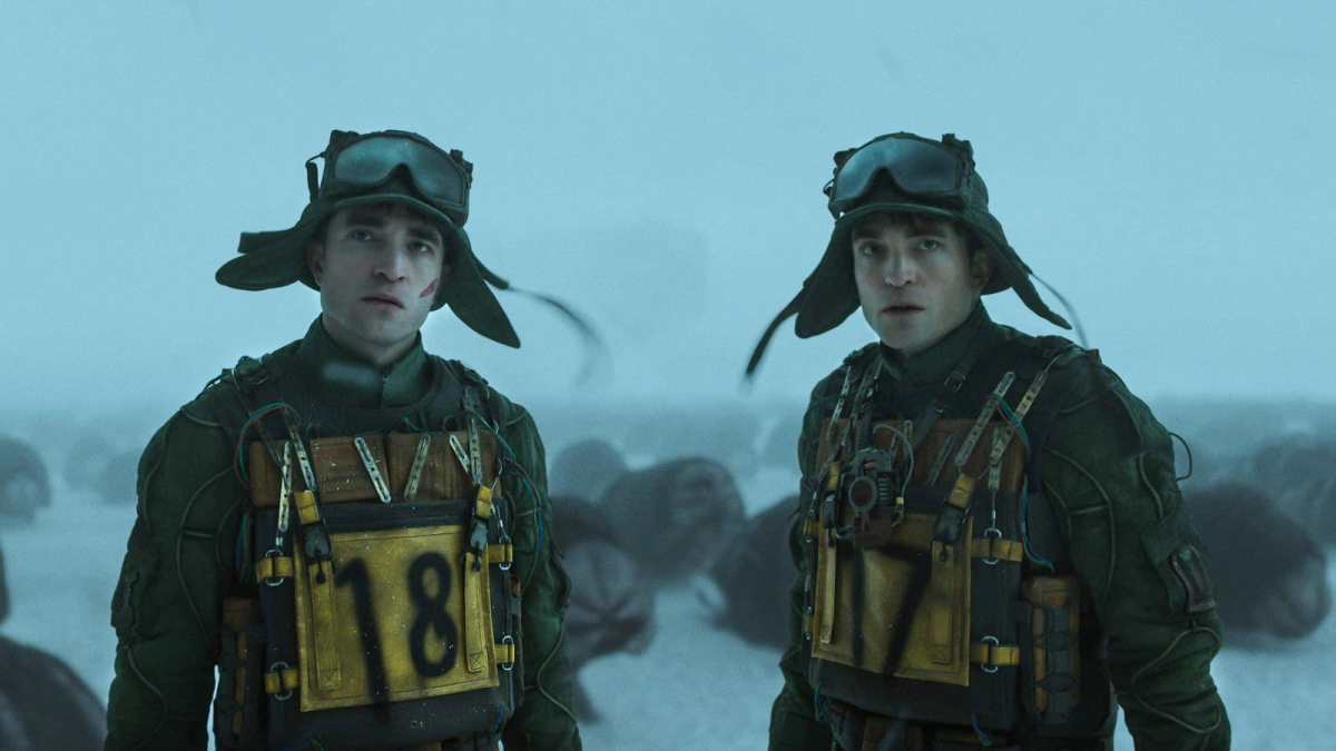 Robert Pattinson as Mickey 18 and Mickey 17 in Mickey 17